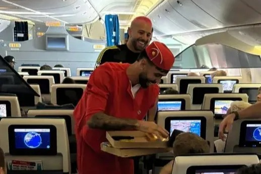 Arsenal star forced to dress as air stewardess on stag do and serves passengers in hilarious pictures