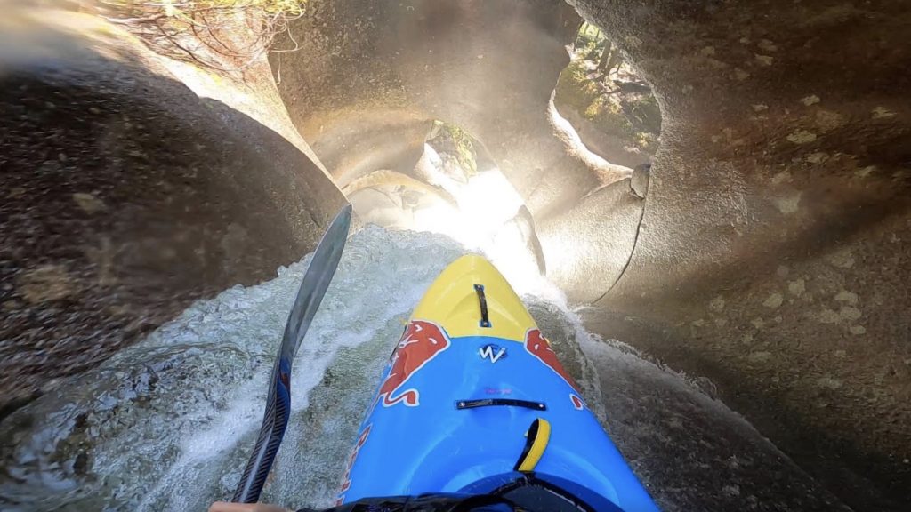 Kayaker Paddles Over A 50 Foot Waterfall Through A Tunnel