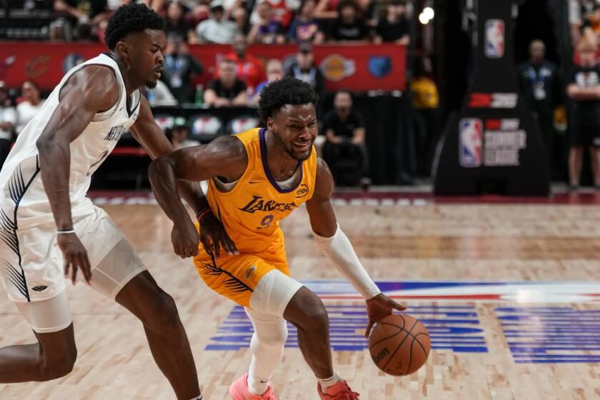 With LeBron James instructing him courtside, Bronny puts on a Summer League show