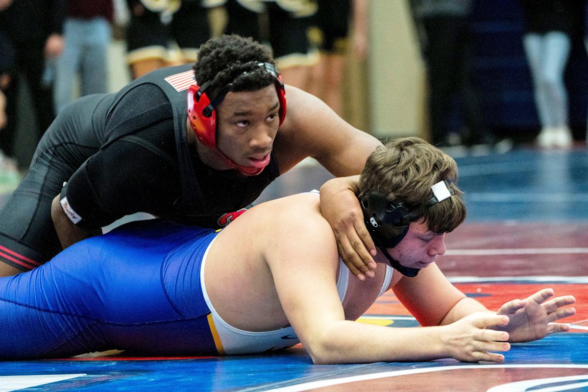 Here are 25 of the top football recruits competing at the Iowa state wrestling tournament