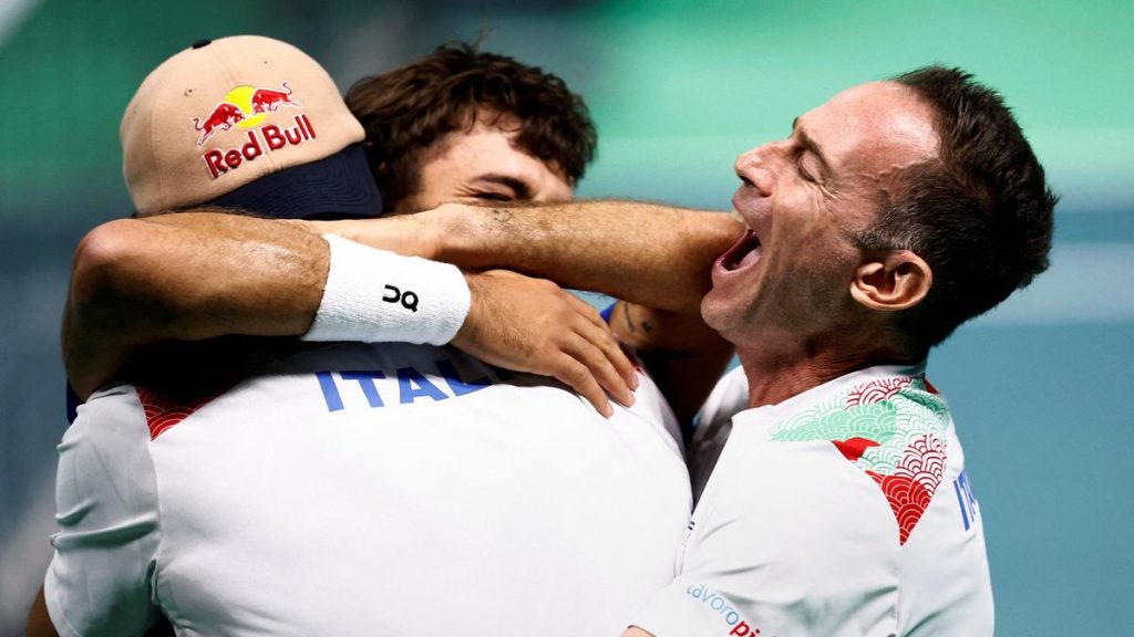 Battling Cobolli sends holders Italy into Davis Cup final Battling Cobolli sends holders Italy into Davis Cup final