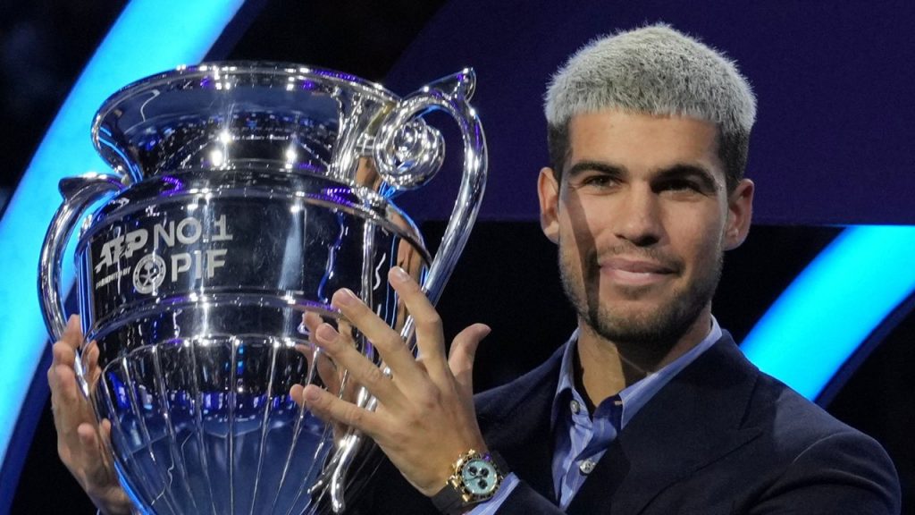 Alcaraz beams with pride as he lifts trophy for year-end No. 1 player Alcaraz beams with pride as he lifts trophy for year-end No. 1 player