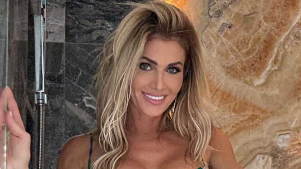 WWE legend Torrie Wilson shows off eye-popping bust in slinky dress aged 50 as she says ‘who’s your Mommy’