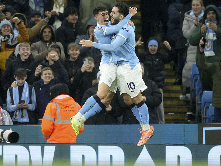 Man City take advantage of Arsenal's stumble to close the gap