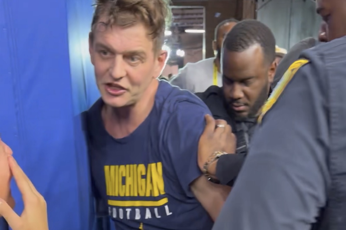 Memories! Postgame Celebration Doesn't End Well For One Michigan Father-Son Duo After Wolverines Win National Title