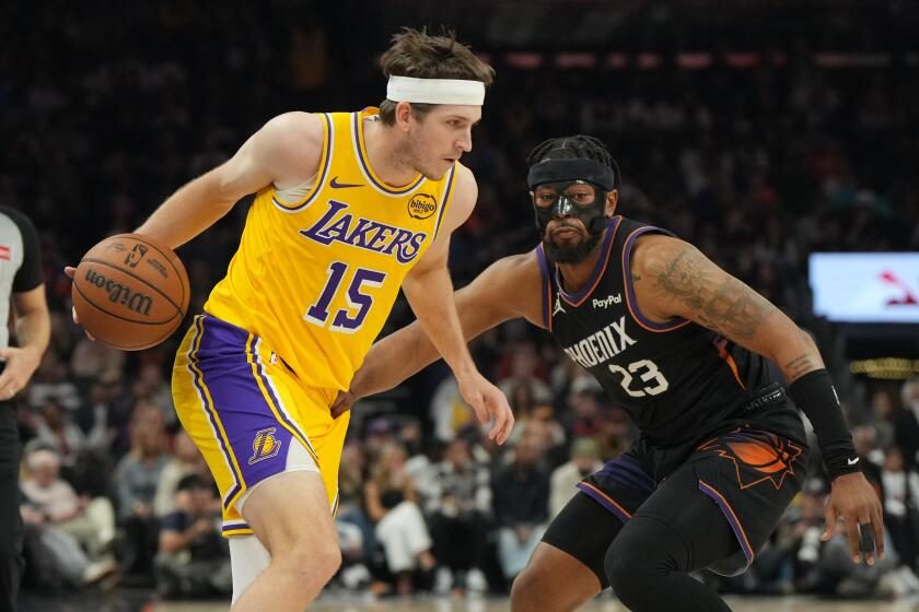 Austin Reaves' return can't save Lakers from dismal defensive effort in loss to Suns