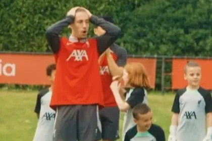 Liverpool fans joke they have unearthed a ‘wonderkid’ as footage captures wholesome moment with Kostas Tsimikas