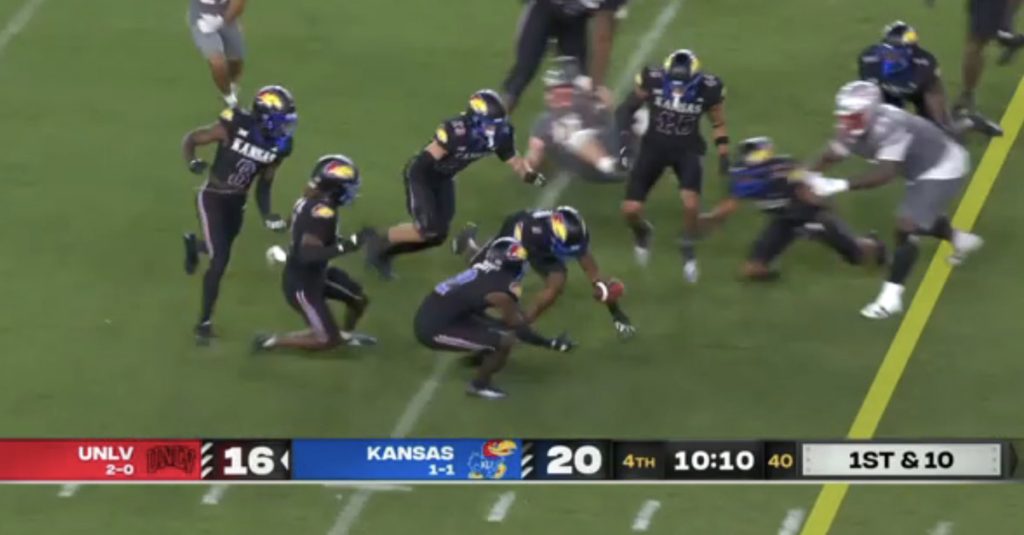 Kansas and UNLV combined for the funniest fumble in college football this season