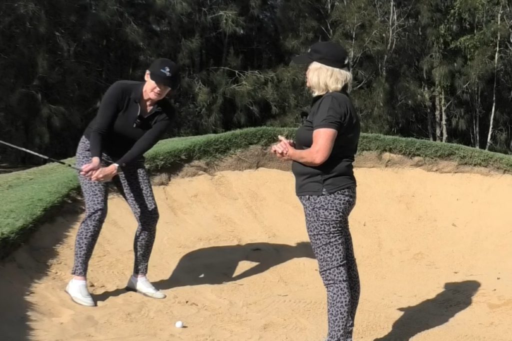 The Hardest Shot in Golf… a Downhill Lie at the Back of the Bunker