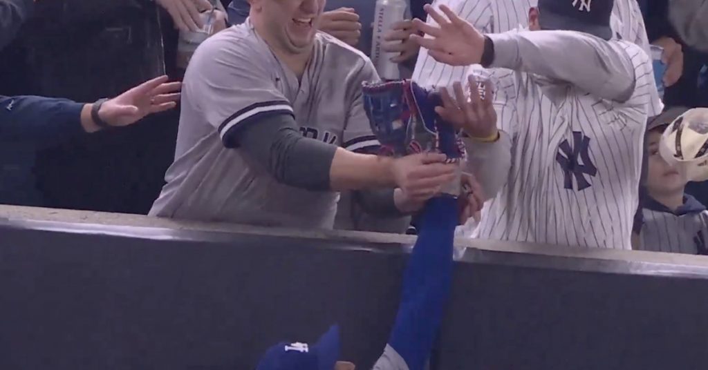 Yankees fan interferes with Mookie Betts in wild World Series Game 4 moment Yankees fan interferes with Mookie Betts in wild World Series Game 4 moment