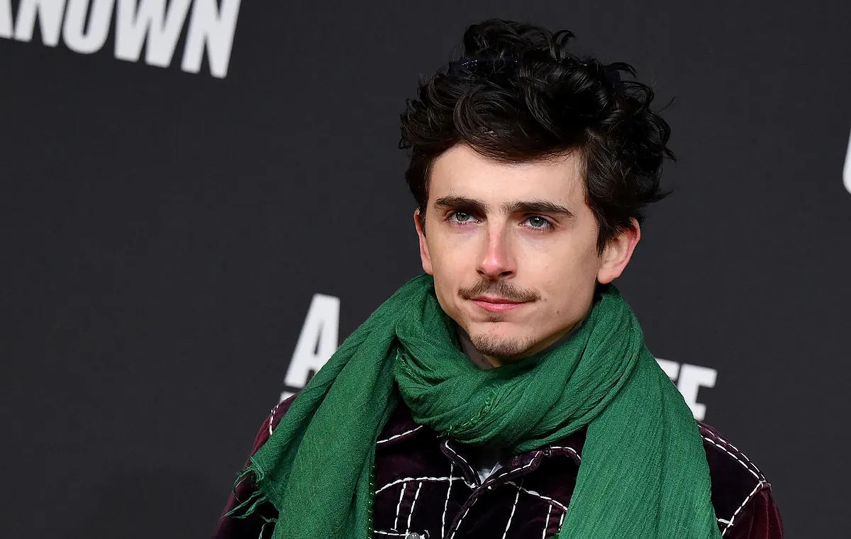 Timothee Chalamet poses alongside Premier League footballer in resurfaced photo labelled 'the most unpredictable crossover ever'