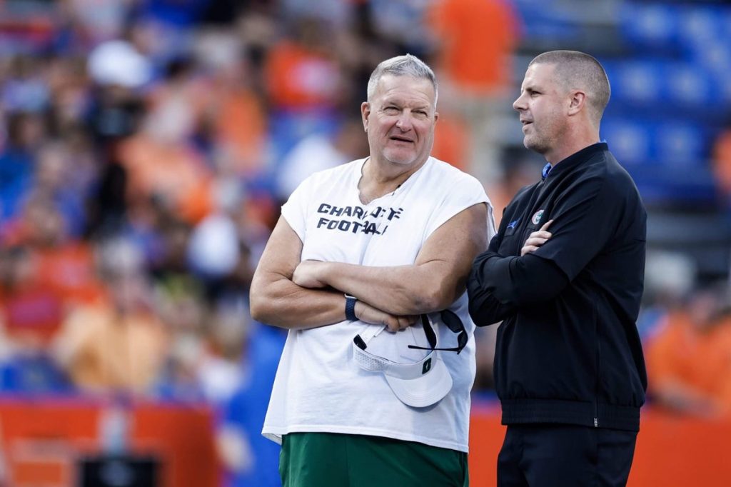 Michigan expected to hire former Charlotte coach Biff Poggi as associate head coach: Source Michigan expected to hire former Charlotte coach Biff Poggi as associate head coach: Source