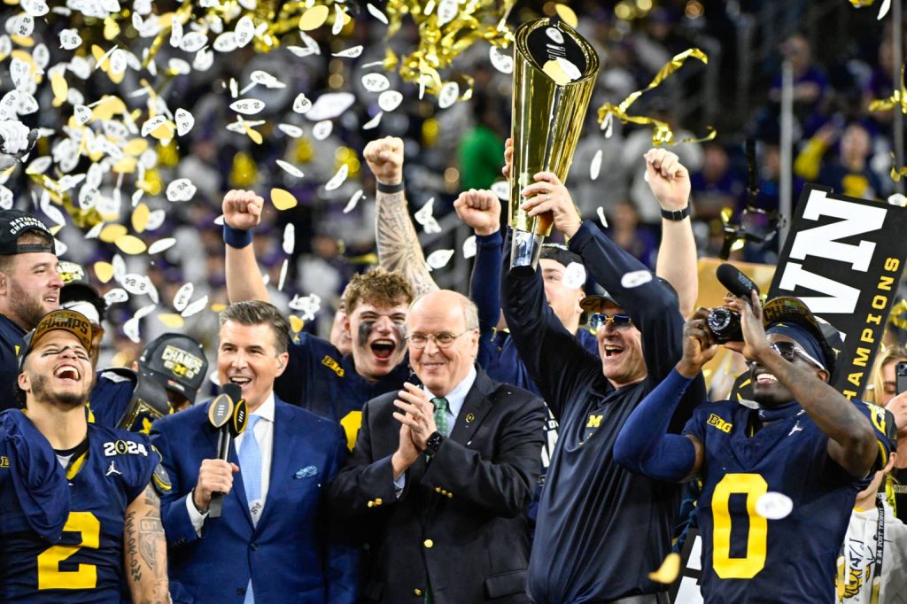 Former Michigan Football Coach Accused Of Stealing 'Intimate' Photos