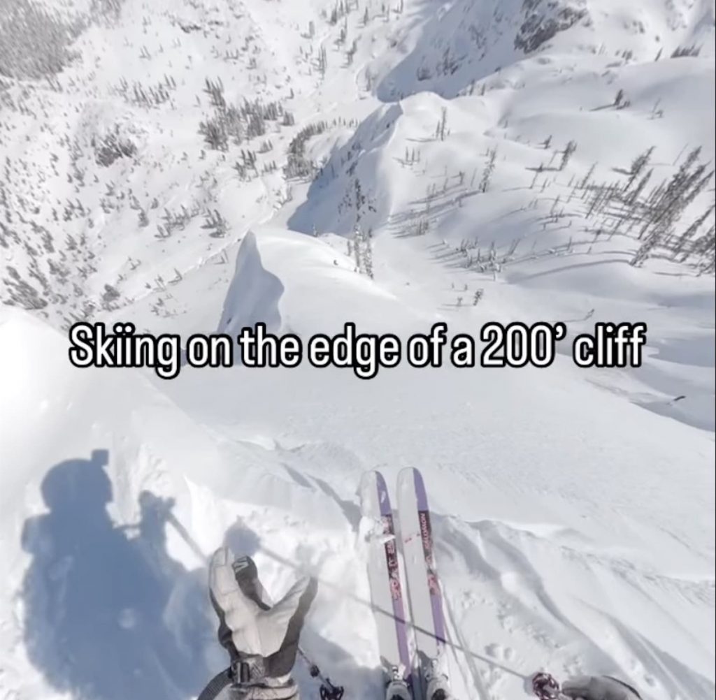 Professional Skier Speeds Down Spine Teetering On 200 Foot Cliff