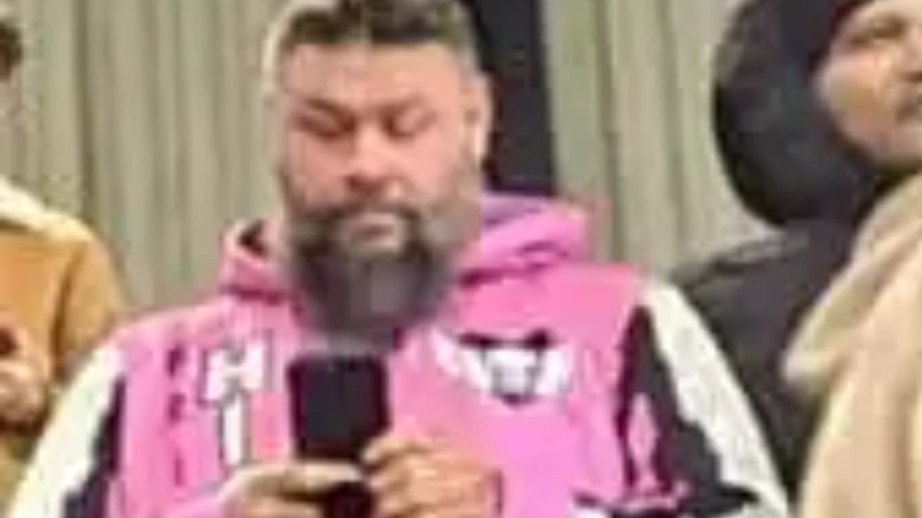 WWE legend stuns fans as he’s spotted at League One football match on trip to the UK – would you have noticed him?